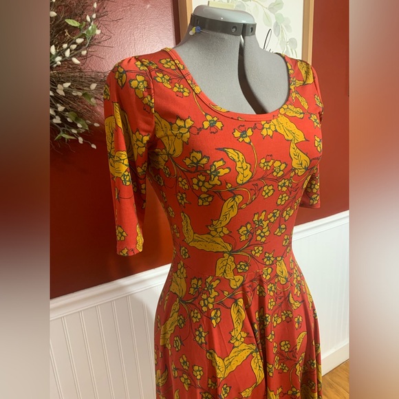 Unique Lularoe Red and Gold flower design dress. - Picture 3 of 5